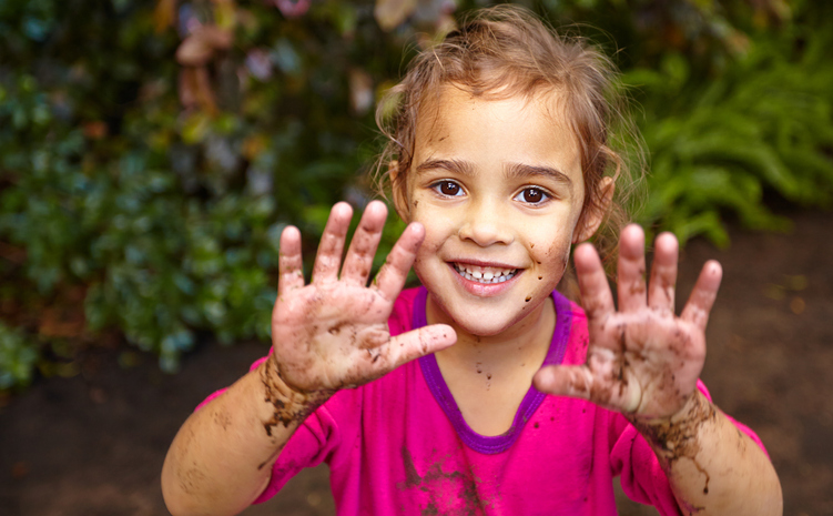 free from laundry child with muddy hands