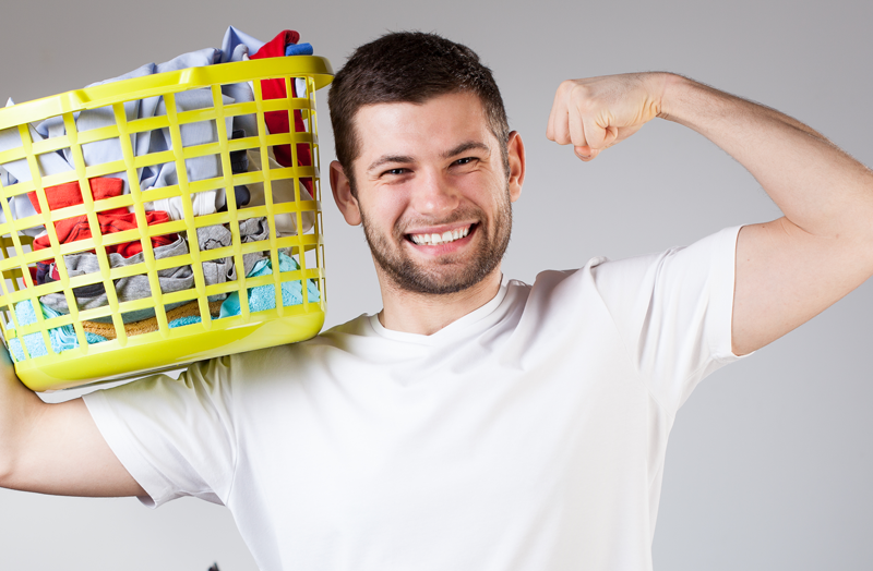 Wash to win winner, man with laundry basket