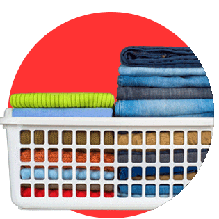 Spot Laundromat laundry service ad. Clothes basket full of folded laundry