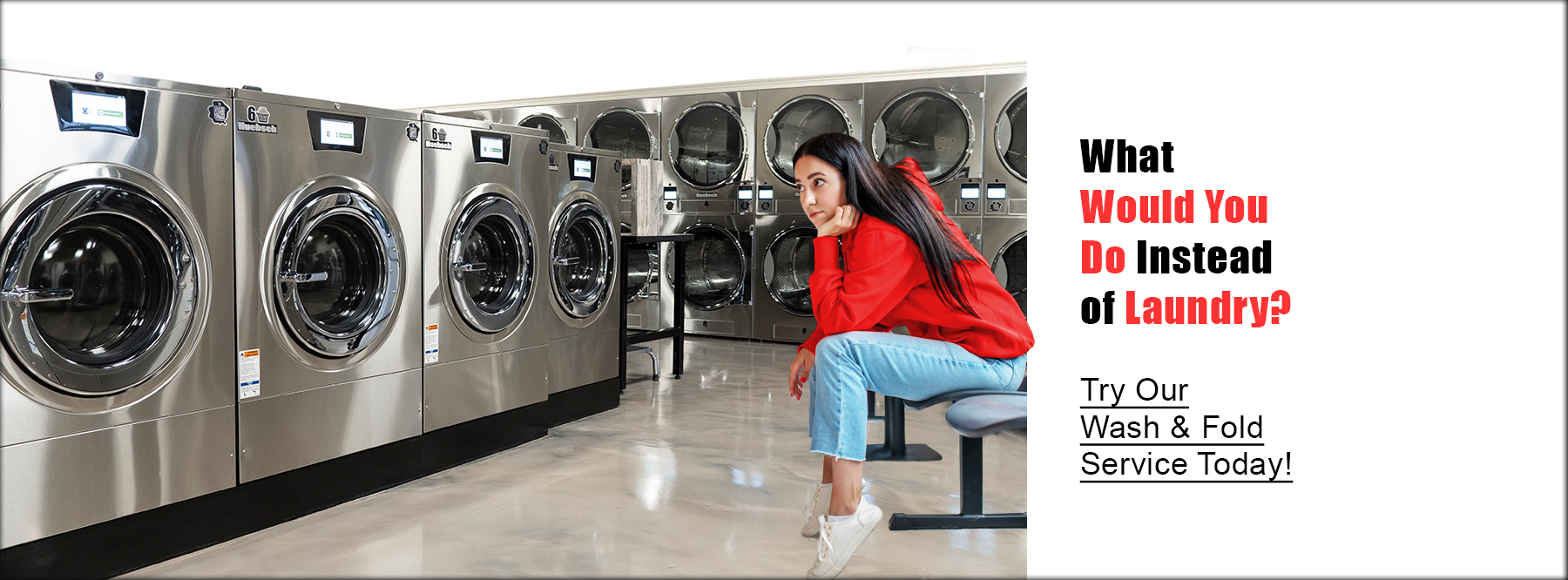 Bored girl watching her laundry wash at a laundromat.