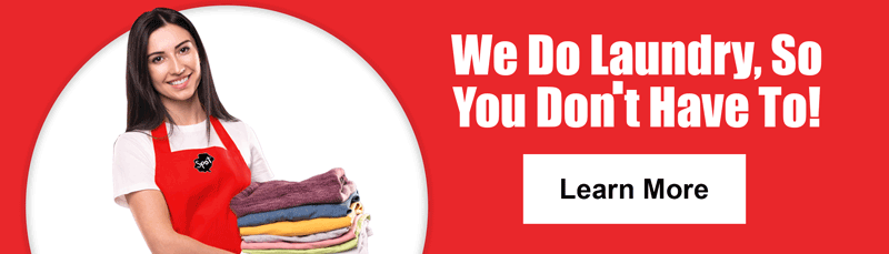 spot laundromat we do laundry so you don't have to! Laundry attendant holding folded laundry