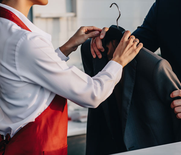 dry cleaner black suit Spot Laundromat